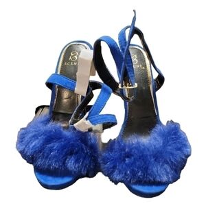 Scene size 5.5 blue, fuzzy heels, new without tags, 5 inch heels, open toe